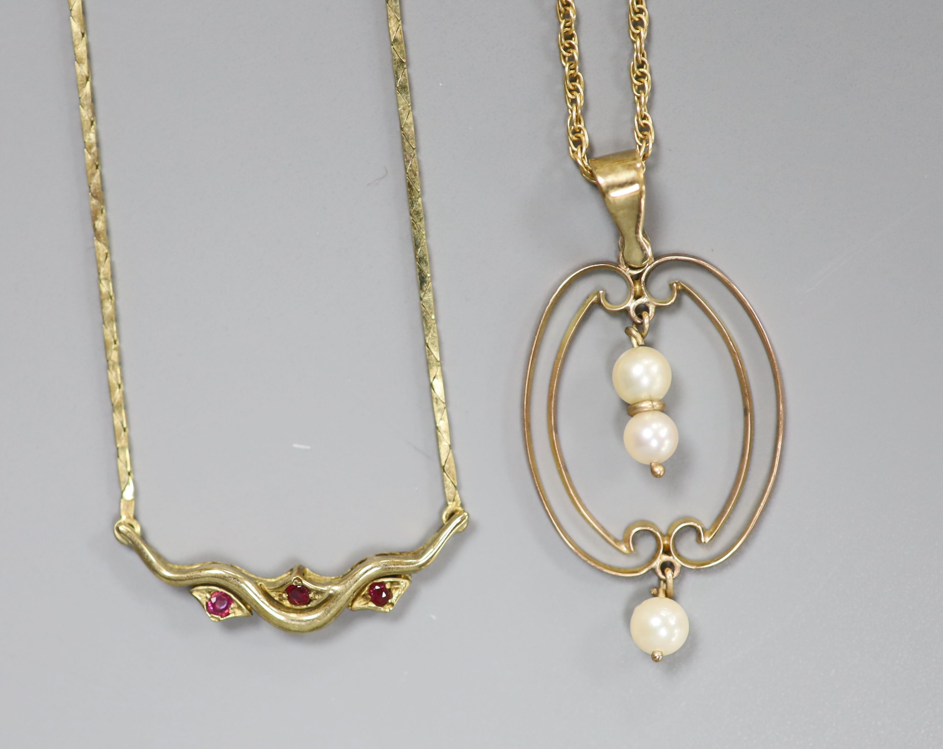 Two modern 9ct and gem set necklaces, one with 9ct cultured pearl set pendant, 35mm